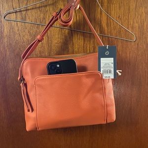 Peach purse with shoulder strap detachable. New with tags.